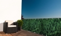 Balkonscherm op maat met afbeelding van een dicht, groen naaldwoud turn up