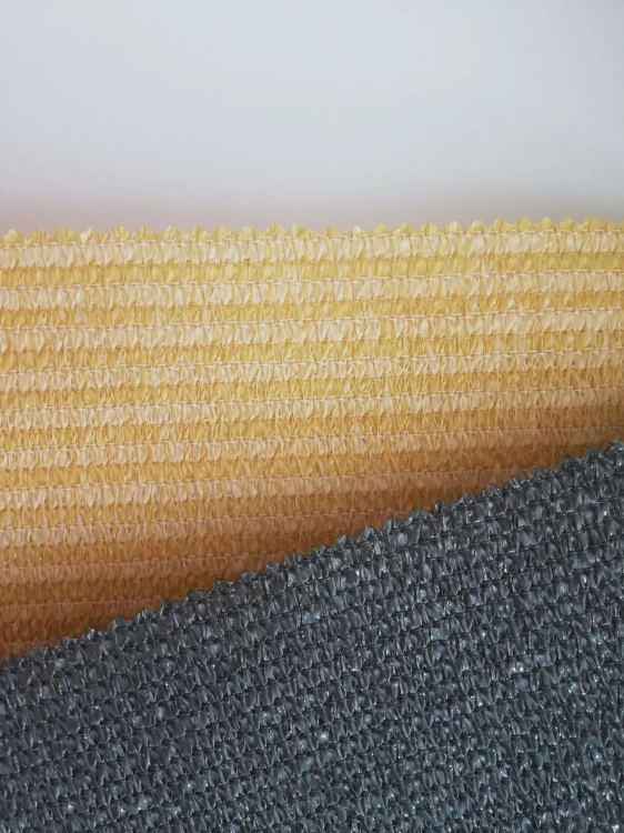 Close-up of beige and grey HDPE balcony screen swatches with breathable, UV-resistant mesh texture