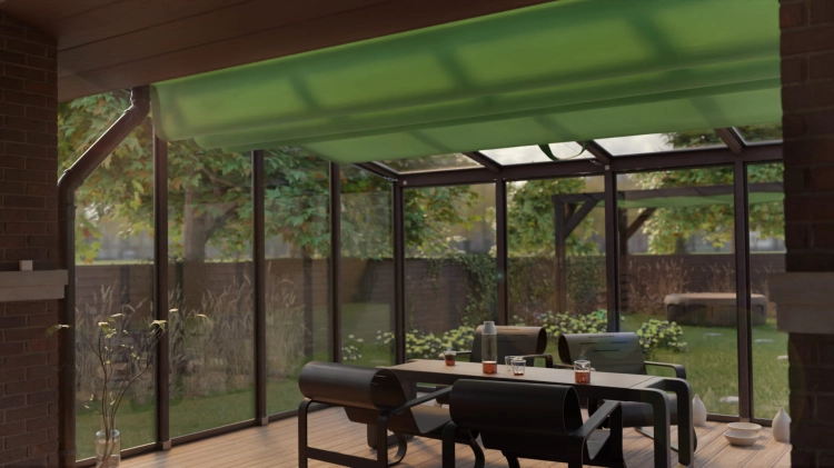 Custom green retractable horizontal sunshade installed on a glass conservatory roof over an outdoor dining set