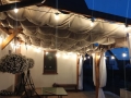 Wasserdichtes ausziehbares Sonnensegel 2,5x4 m Premium mit Lichterkette auf der Terrasse am Abend