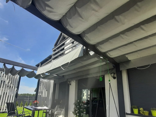 Premium waterproof roman blind for a 3x4 m terrace providing sun protection over an outdoor patio area
