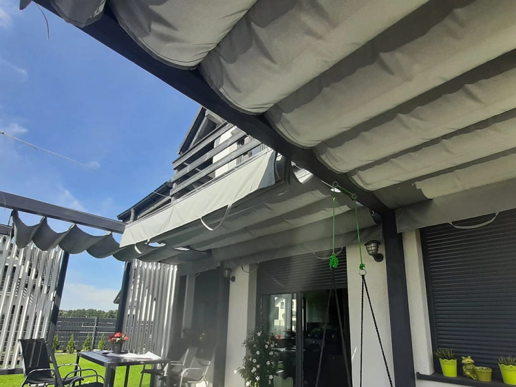 Premium waterproof roman blind for a 3x4 m terrace providing sun protection over an outdoor patio area