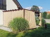 3x4 m waterproof premium roman blind installed on a wooden terrace pergola for sun protection and privacy