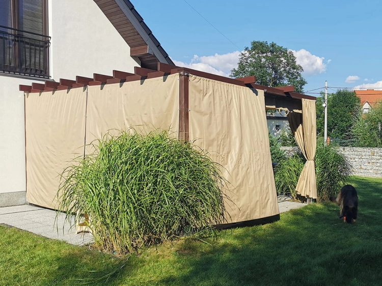 3x4 m waterproof premium roman blind installed on a wooden terrace pergola for sun protection and privacy