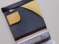 Musterbuch mit professionellen Sunshade Materialproben aus PVC- und Mesh-Geweben für Sonnenschutzsysteme