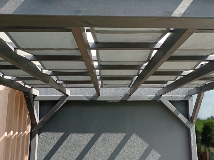 Premium waterproof sunshade sail strips installed on a wooden garden pergola for outdoor patio shade.