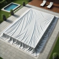 Custom-sized white swimming pool cover protecting a rectangular inground pool on a modern patio with lounge chairs.