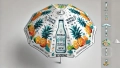 Custom printed garden parasol featuring tropical beverage graphics with pineapples and citrus fruits on a white canopy.