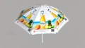 White advertising parasol with tropical fruit graphics, pineapple, orange and bottle of juice for garden or patio.