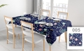 Custom floral printed stain-resistant tablecloth on a dining table with chairs and place settings