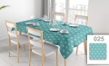 Stain-resistant rectangular tablecloth featuring a teal nautical ship wheel pattern, set for a formal dinner.
