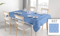 Customizable blue stain-resistant tablecloth with a white anchor pattern and polka dots for dining tables