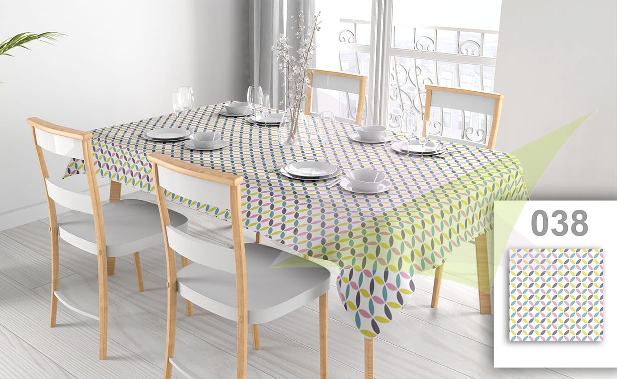 Stain-resistant rectangular tablecloth with a colorful geometric leaf pattern in a modern dining setting.