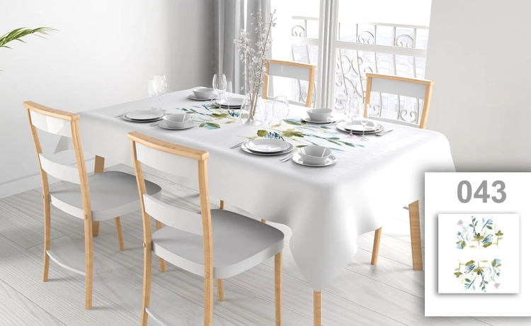 Stain-resistant rectangular tablecloth with custom watercolor floral print on a set dining table with chairs