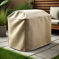 Custom-fit beige outdoor furniture cover on a patio next to a wooden bench and potted plant