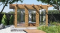 Modern wooden terrace enclosure featuring custom clear PVC tarpaulins with white printed borders around glass panels