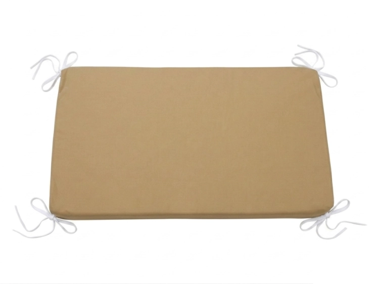 Tan custom waterproof outdoor cushion cover with white tie straps for patio furniture seat pads.