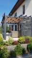 Toldo impermeable para pérgola de 0,7x5 m en color beige como cubierta de terraza moderna premium