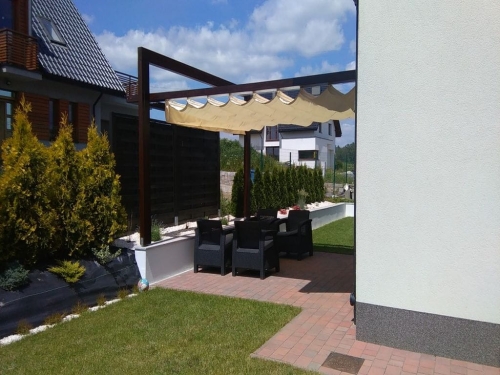 Retractable 3x4m Roman awning for patio shade over outdoor furniture in a modern garden setup