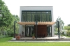 Roman terrace blind 3x4 m in premium waterproof fabric providing sun protection over a modern house patio