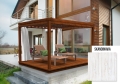 Custom outdoor curtains on a modern wood pergola with lounge chairs on a backyard patio overlooking a glass wall house