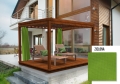 Green waterproof outdoor curtain on a modern wooden pergola with sun loungers beside a contemporary house.