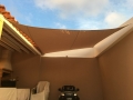 Wasserdichtes rechteckiges Premium Sonnensegel 3x4 m montiert als Sonnenschutz auf der Terrasse